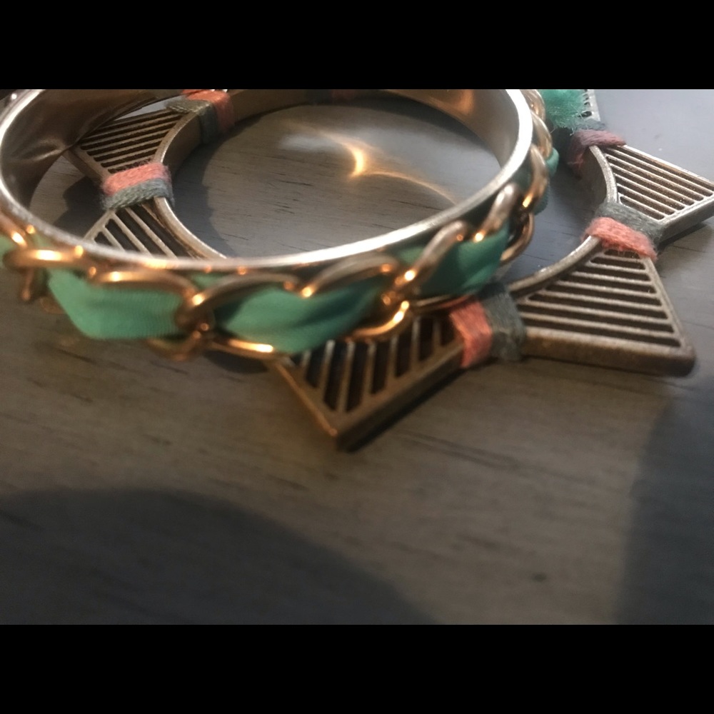 Two mixed metal and cloth bracelets